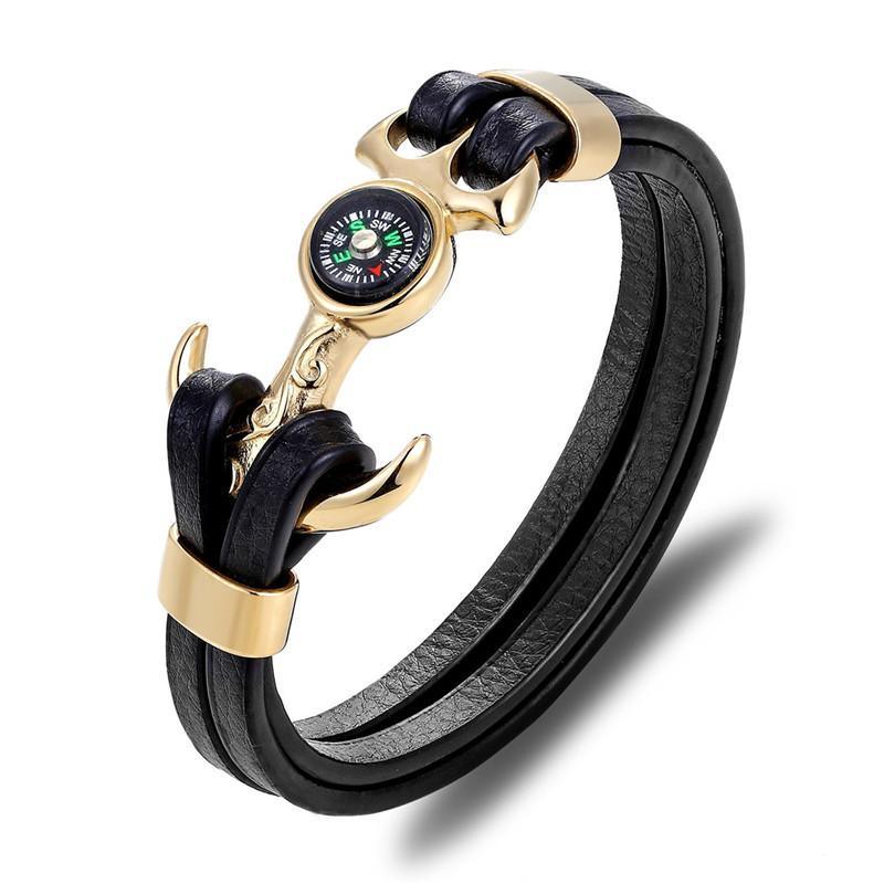 Multi-layer leather and stainless steel nautical charm bracelet with skull, anchor, and compass detailing.