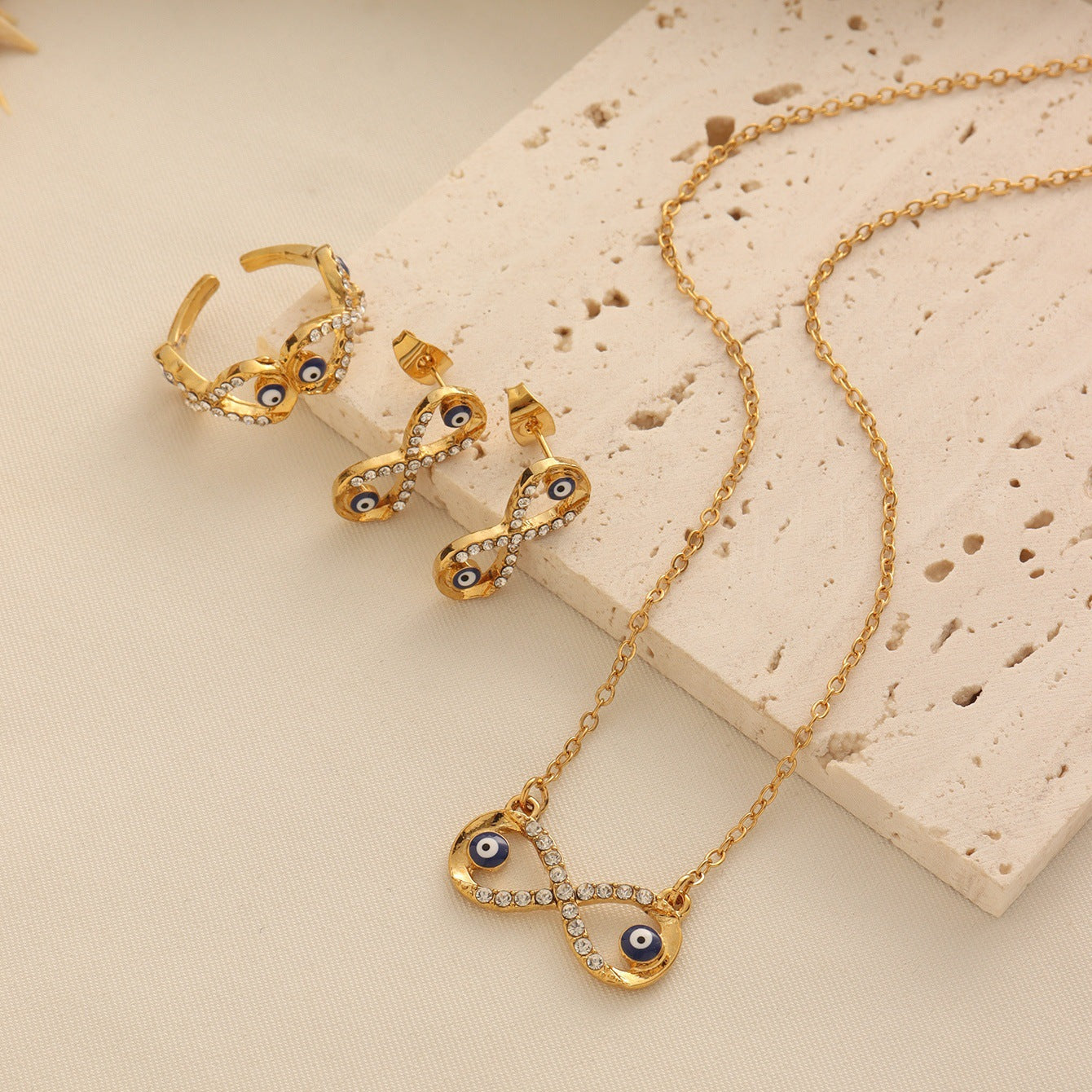 Evil Eye Jewelry Set with White Crystal Accents in Gold Tone