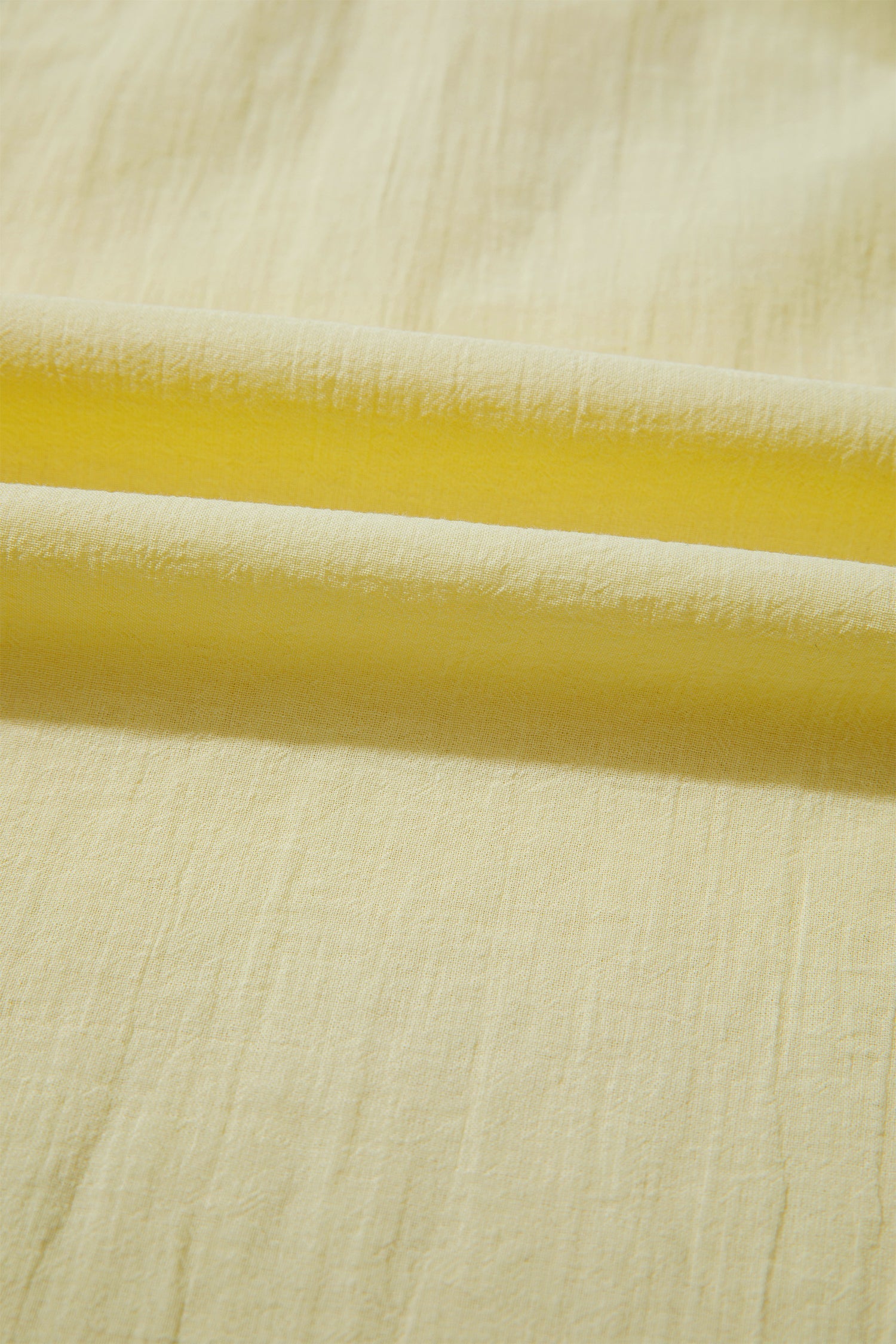 Solid V-Neck Sleeveless Top with Ruffle Trim in Yellow
