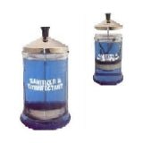 A 21 oz clear glass manicure sterilizer jar with a metallic lid on a clean surface