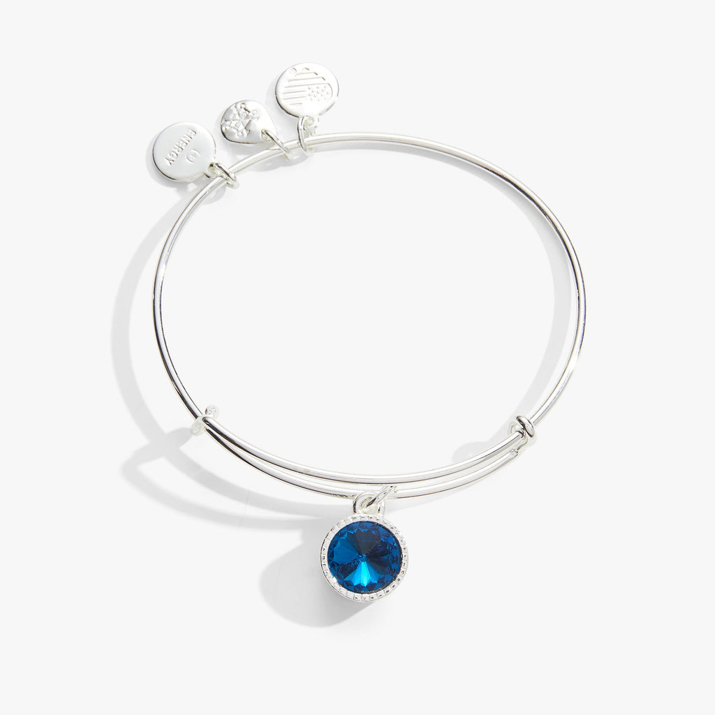 December birthstone charm bangle with sparkling blue zircon crystal