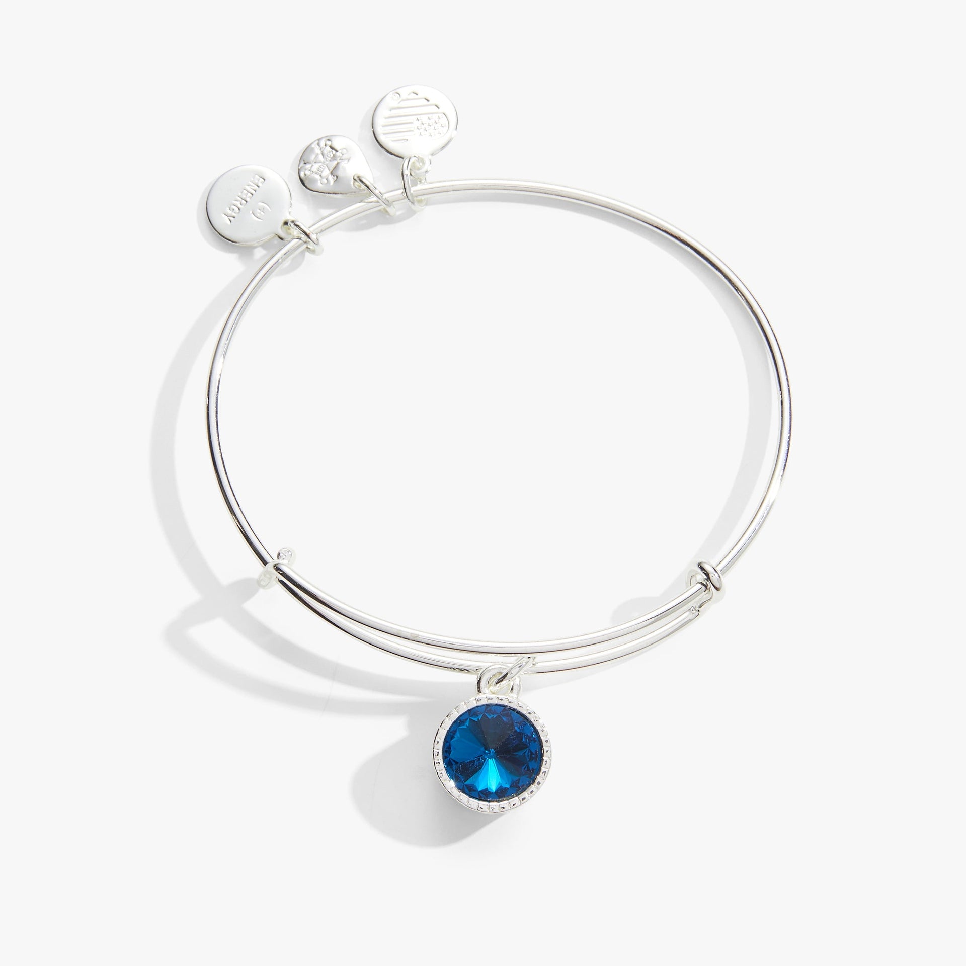 December birthstone charm bangle with sparkling blue zircon crystal