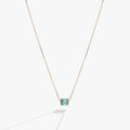 Alex And Ani December birthstone pendant necklace featuring blue baguette crystals in a sterling silver or gold vermeil barrel charm.