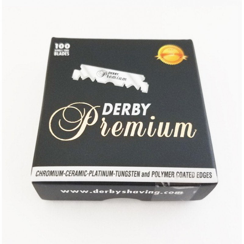 100-pack of premium single edge blades in sleek black packaging with gold and white modern typography.
