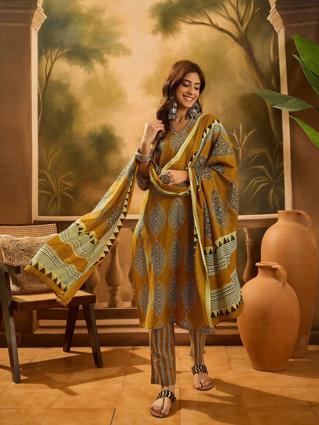 Mustard yellow pure cotton kurta set featuring traditional prints