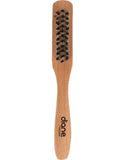 Minimalist 6-inch wooden clipper cleaning brush with black bristles on a neutral background.