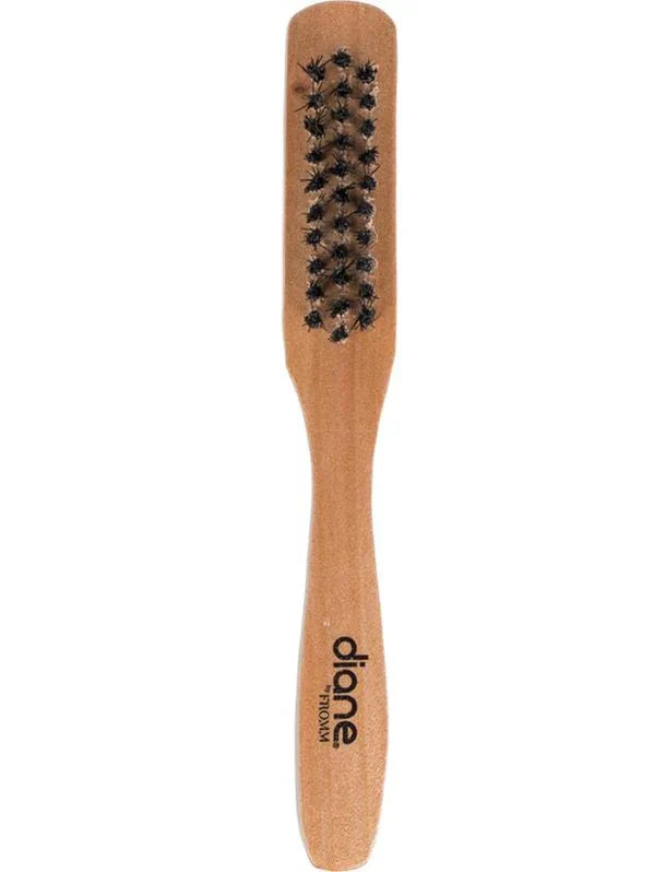 Minimalist 6-inch wooden clipper cleaning brush with black bristles on a neutral background.
