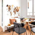 Wooden world map wall art displayed in a modern, rustic dining room
