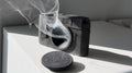 A grey and white concrete Analog Camera sculpture, minimalist desk decor
