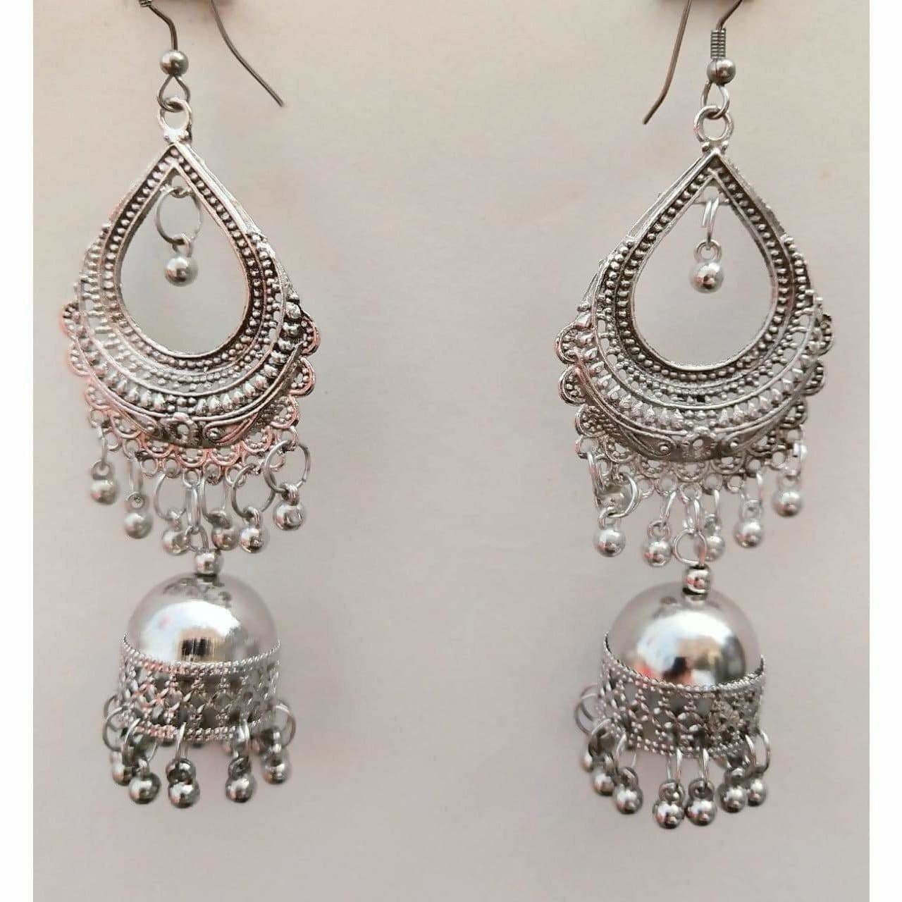 Long Afghani style silver oxidized brass jhumka earrings with pearl tassels