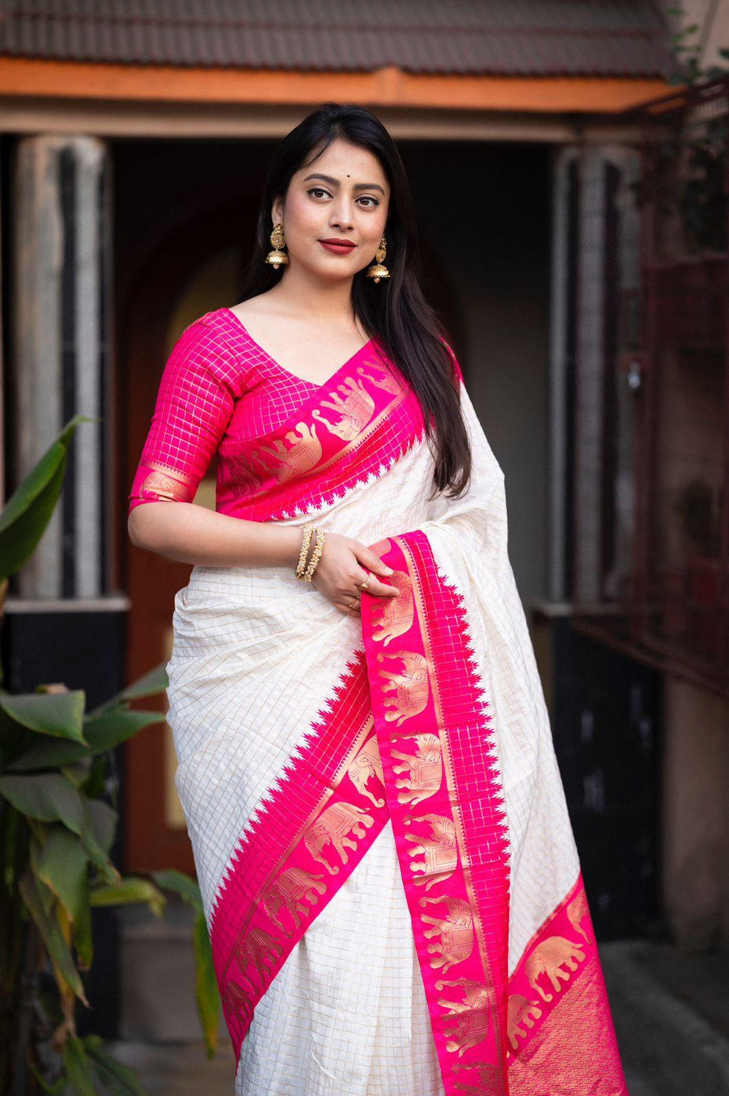 Rani Silk Zari Woven Saree with Elephant Border and Rich Pallu