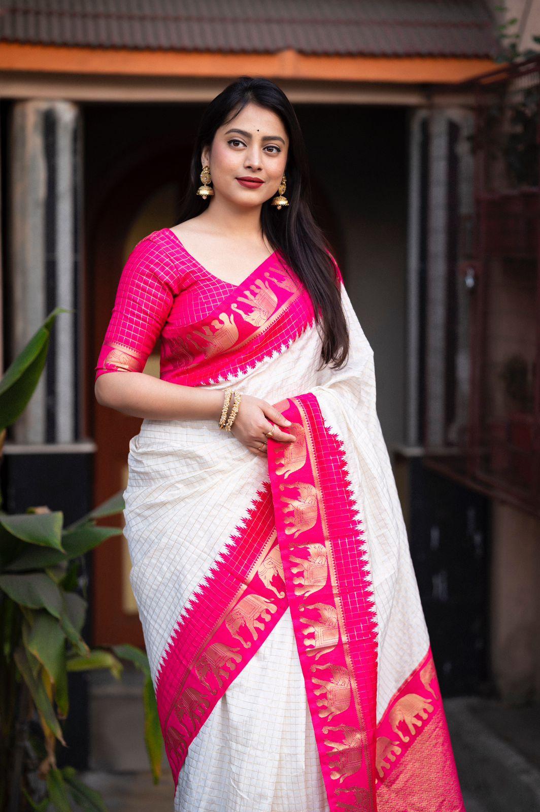 Rani Silk Zari Woven Saree with Elephant Border and Rich Pallu