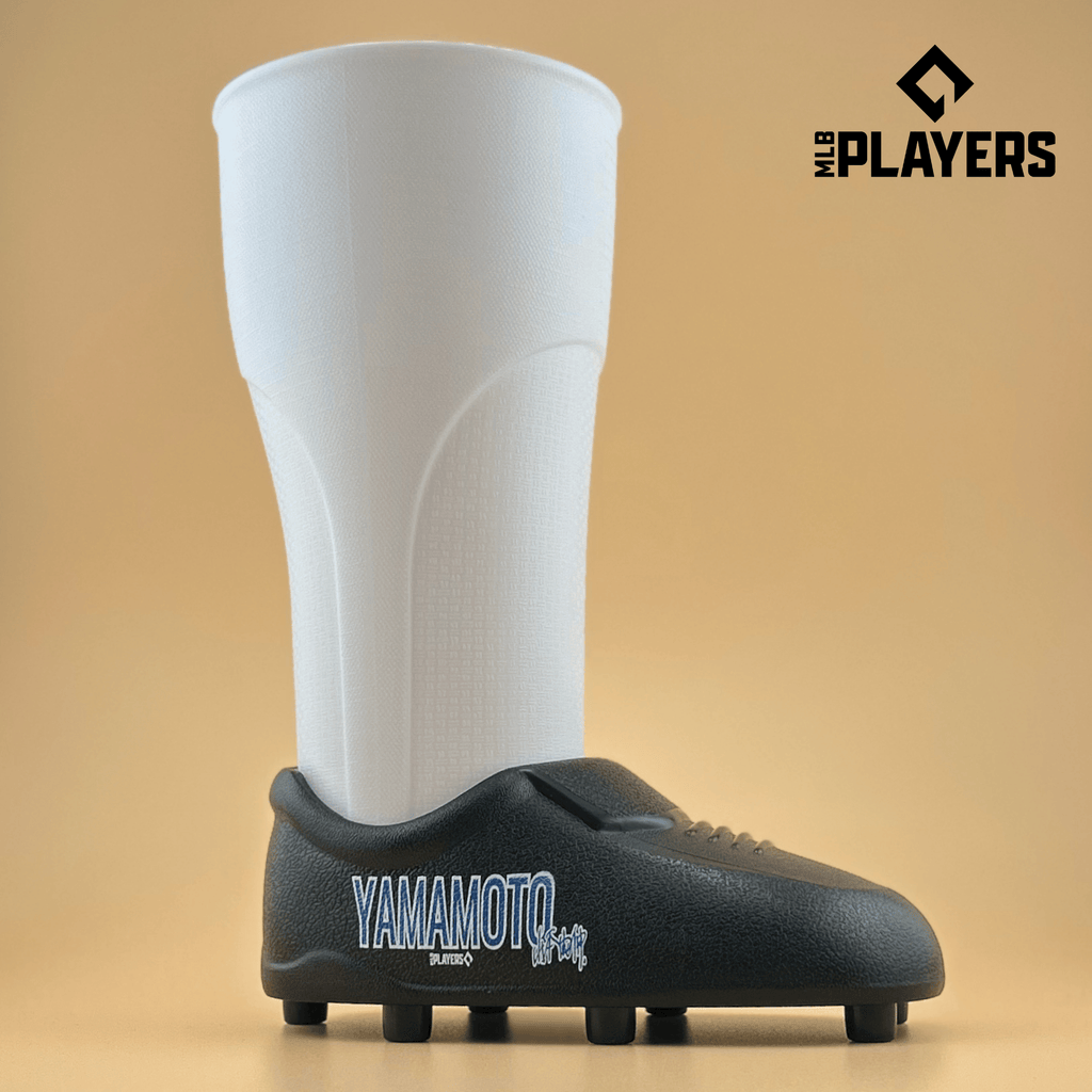 Yoshinobu Yamamoto themed cleat-shaped cup in white and black, 22oz capacity