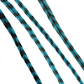 Close up of turquoise striped feather hair extension for women