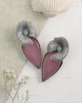 Oxidised finish brass stud earrings with antique pattern detail.