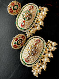 Multicolor Meenakari brass stud earrings with traditional Indian design.