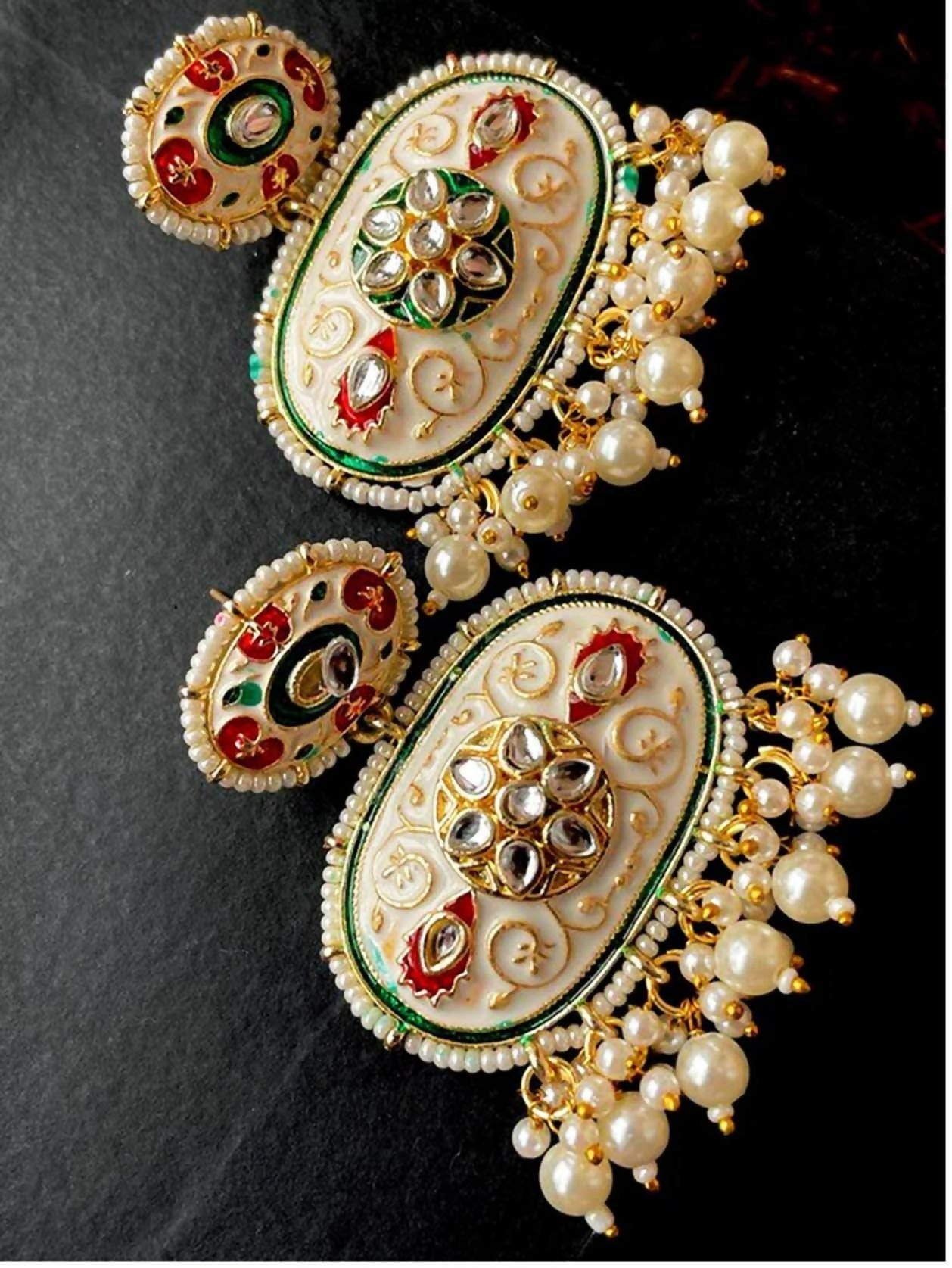 Multicolor Meenakari brass stud earrings with traditional Indian design.