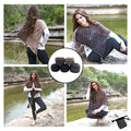 A finished lightweight hand-knitted poncho made from colorful recycled silk yarn.