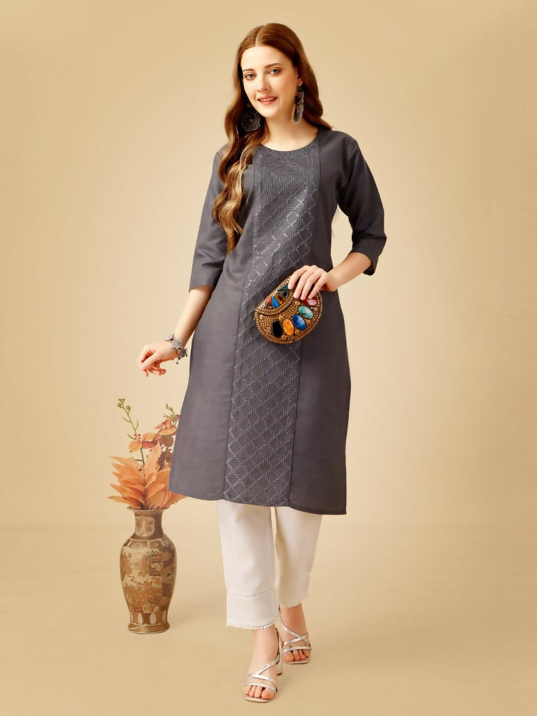 Woman wearing a grey Cotton Magic Slub embroidered kurta pant set with sequence work