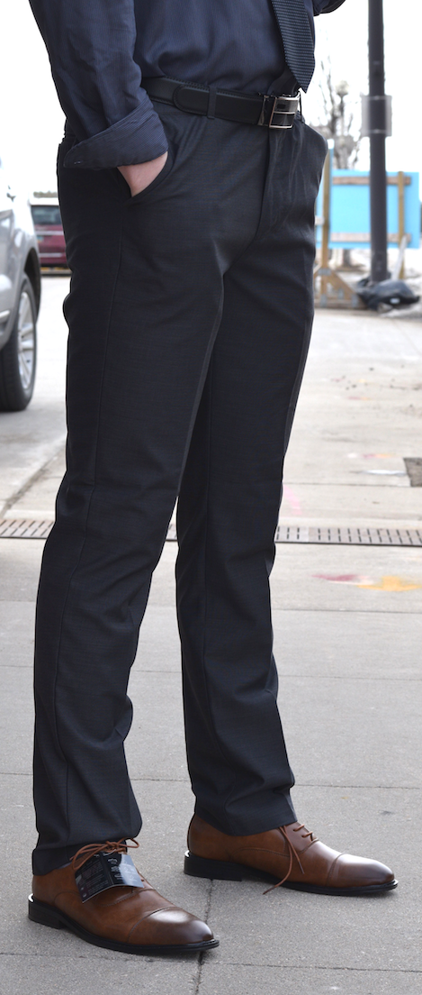 Close-up view of charcoal dress pants featuring a tailored fit and clean finish.