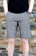 A pair of Navy Riverton cotton-linen blend shorts in a classic cut