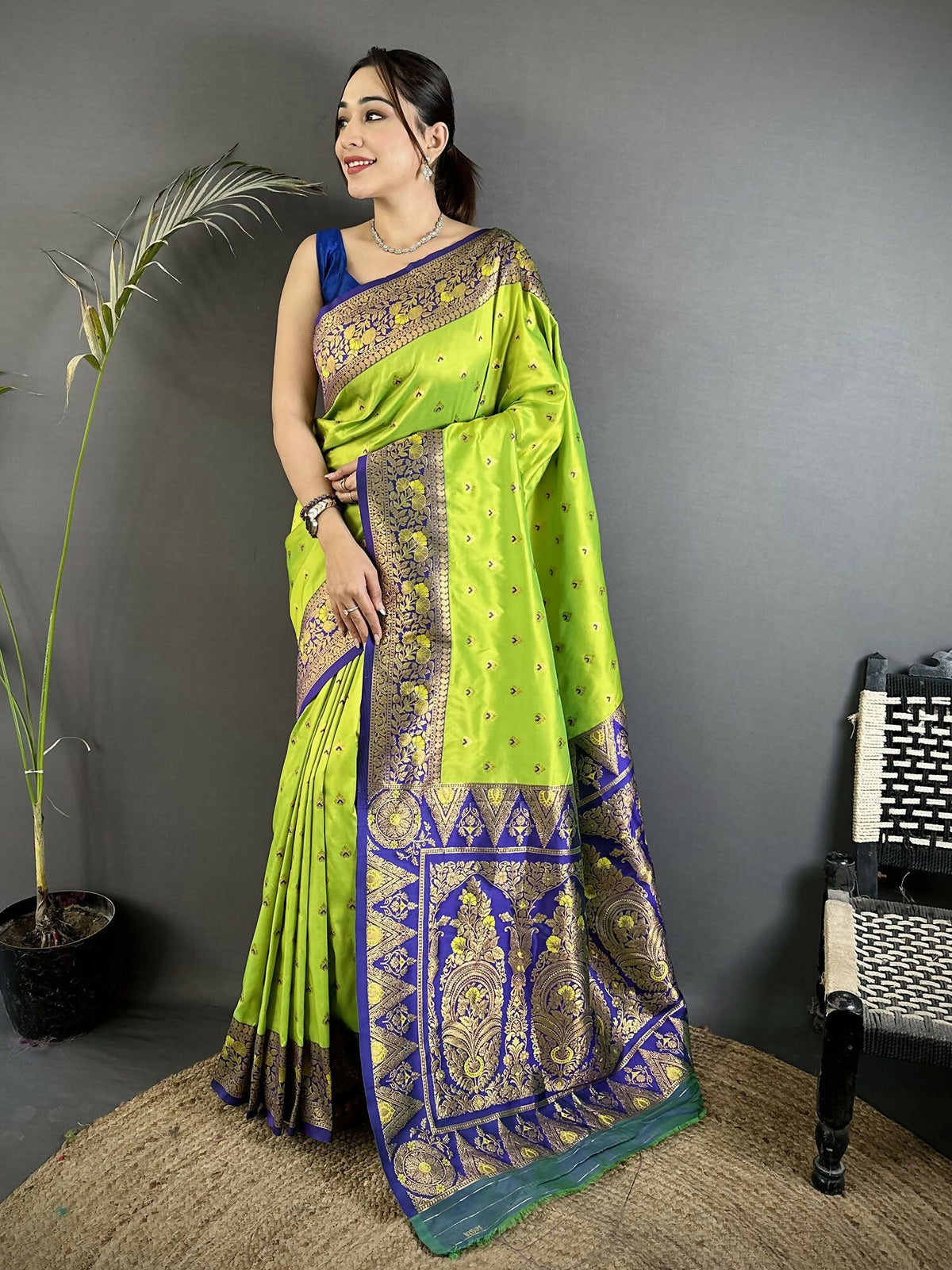 Parrot Green Soft Silk Banarasi Saree with traditional motifs and included blouse piece.