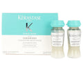 Set of 10 Kérastase Fusio-Dose Concentre Resistance treatments in teal and white packaging.