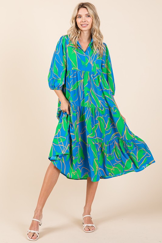 Modern tiered midi dress with an abstract print and collared neck in blue and green