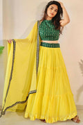 Yellow georgette lehenga choli featuring three-layer frill stitching and a designer silhouette.