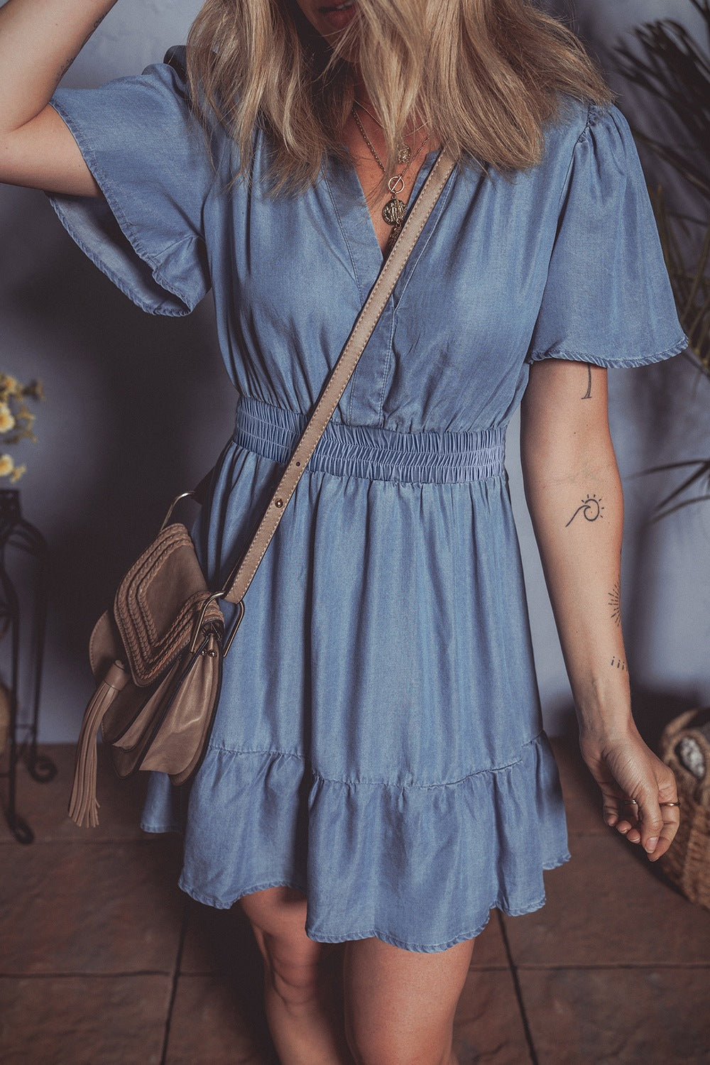 Ruffled Hem Smocked Flutter Sleeve Denim Mini Dress