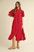 A red cotton shirt dress with puff sleeves and a mineral wash finish.
