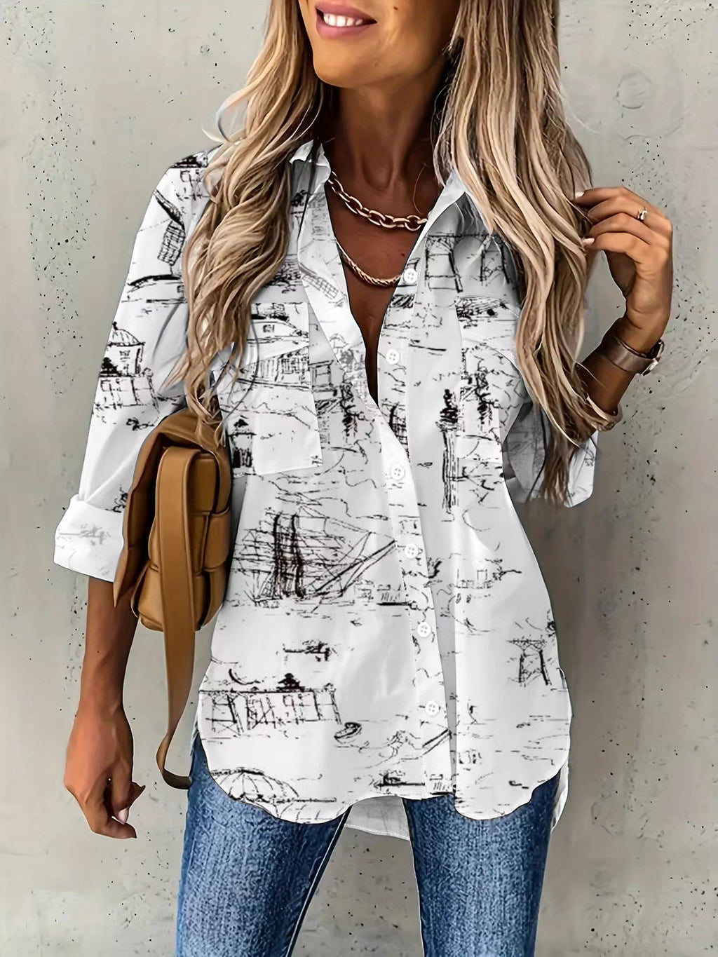 Model wearing a long sleeve button-down shirt with pockets in a white landscape print pattern