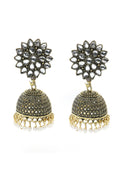 A pair of traditional Kundan Jhumka earrings adorned with elegant white beads.