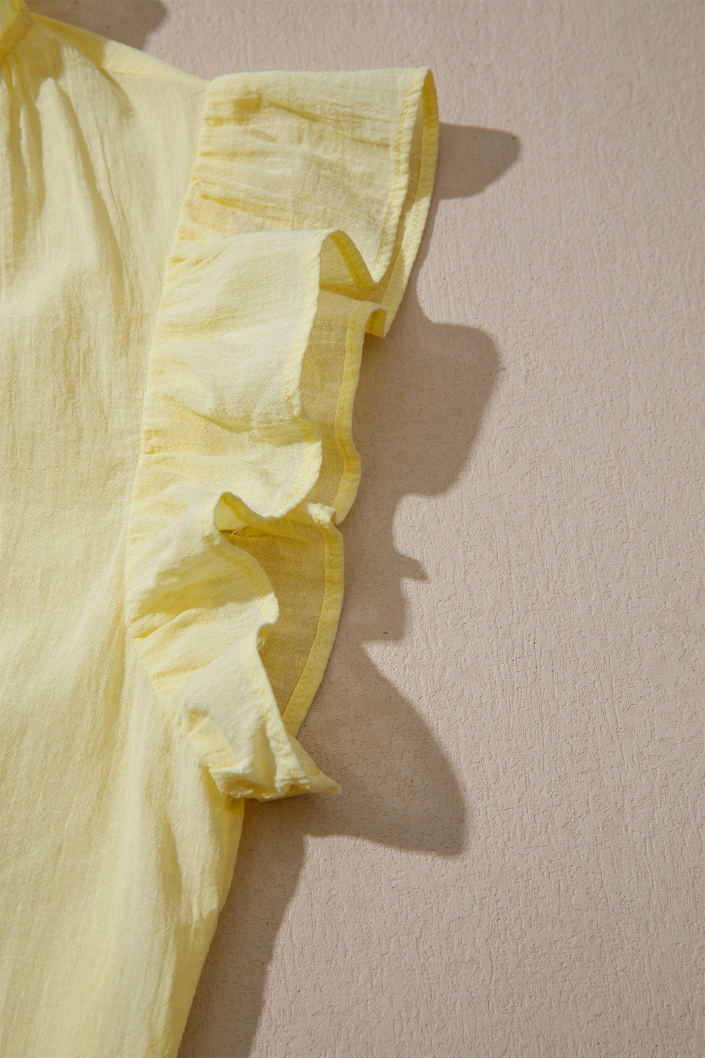 Solid V-Neck Sleeveless Top with Ruffle Trim in Yellow