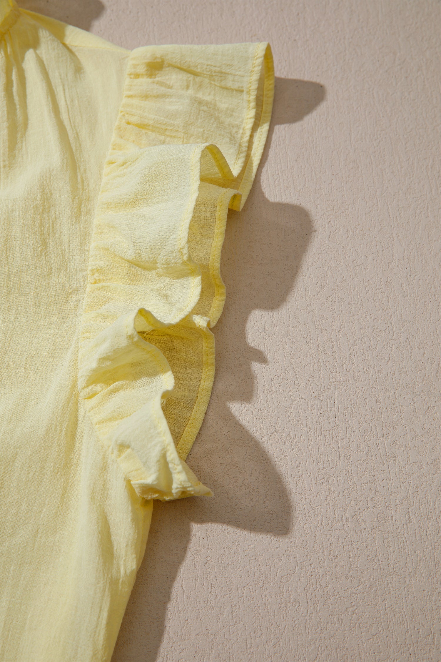 Solid V-Neck Sleeveless Top with Ruffle Trim in Yellow