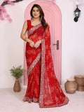 Model wearing a vibrant red georgette saree with traditional Rajwadi Bandhani print.