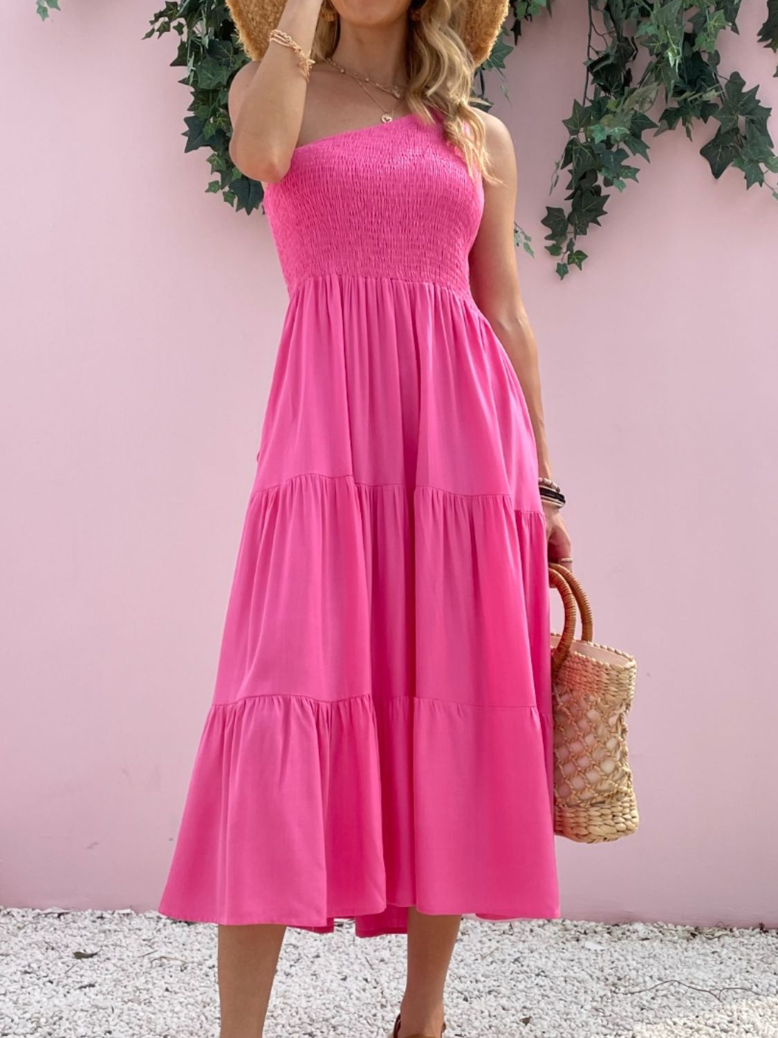 Sleeveless one-shoulder smocked dress in pink, perfect for beach and summer styling