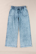 Yamileth light blue mineral wash loose straight leg pants with elastic drawstring waist and front pockets on a neutral background