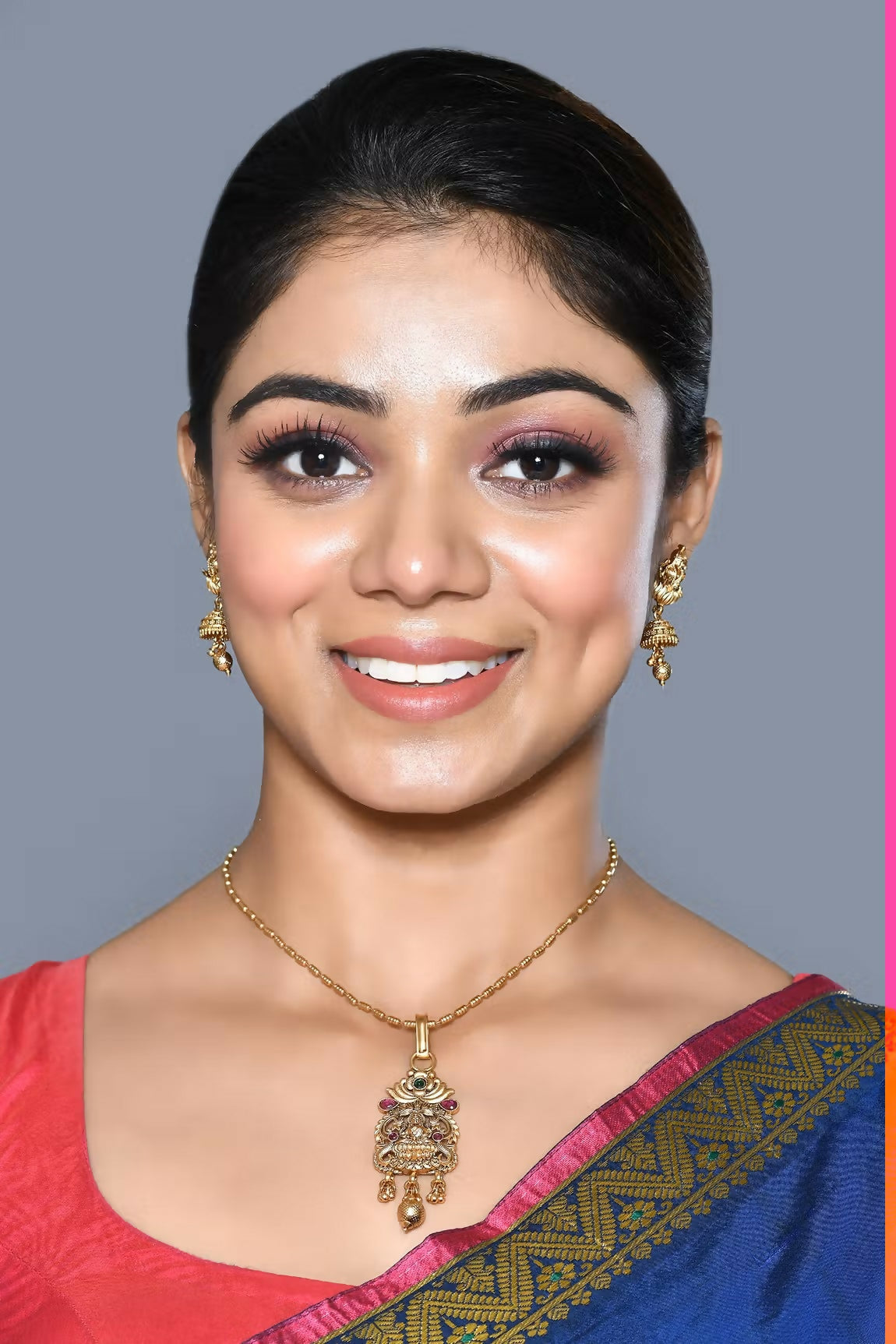 Golden Ruby Green Jadau Kundan pendant set with matching earrings