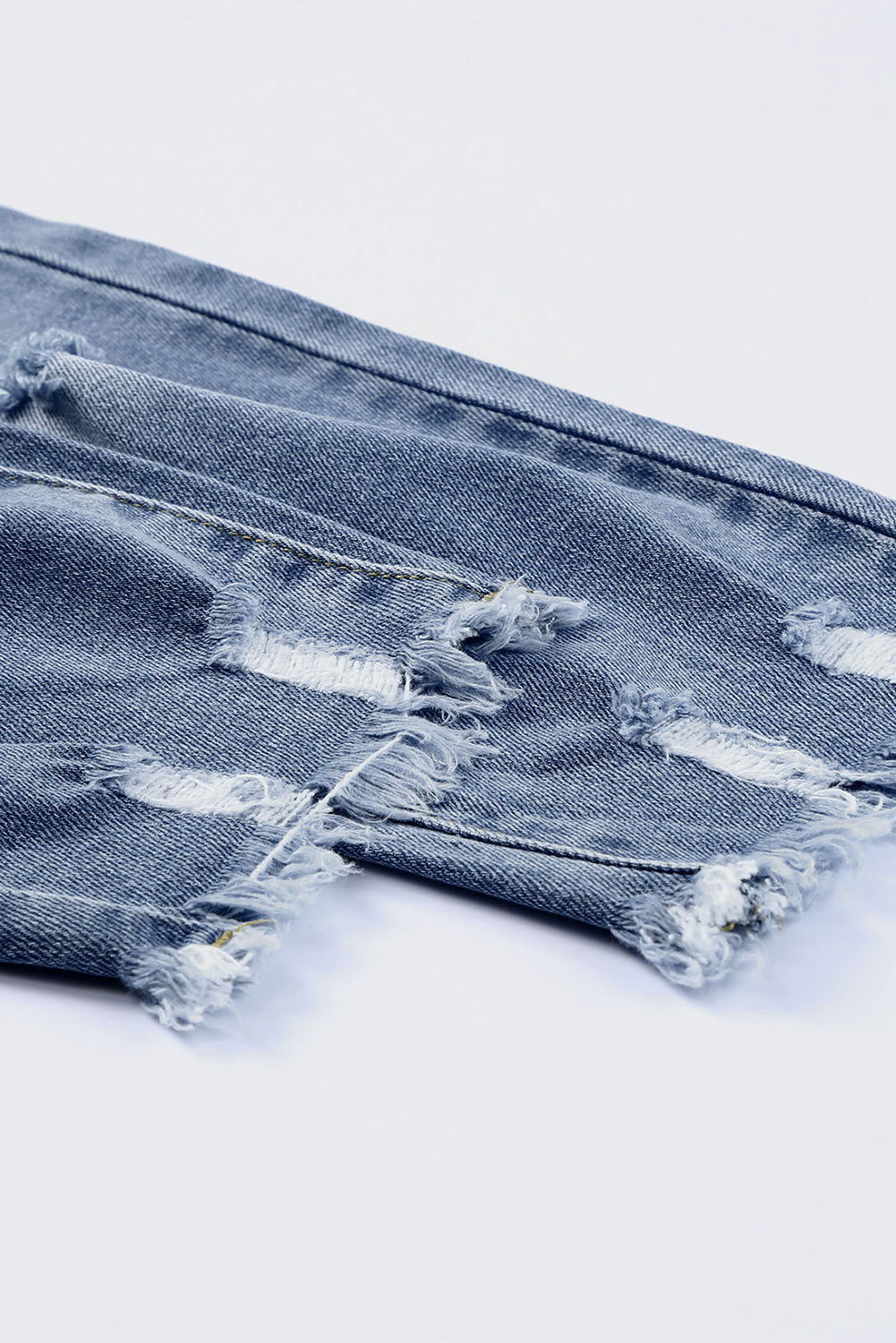 Georgia High-Rise Distressed Skinny Capri Jeans in Medium Blue