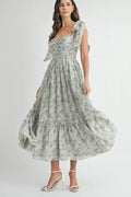 Floral print midi dress with ruched bust and shoulder tie straps.