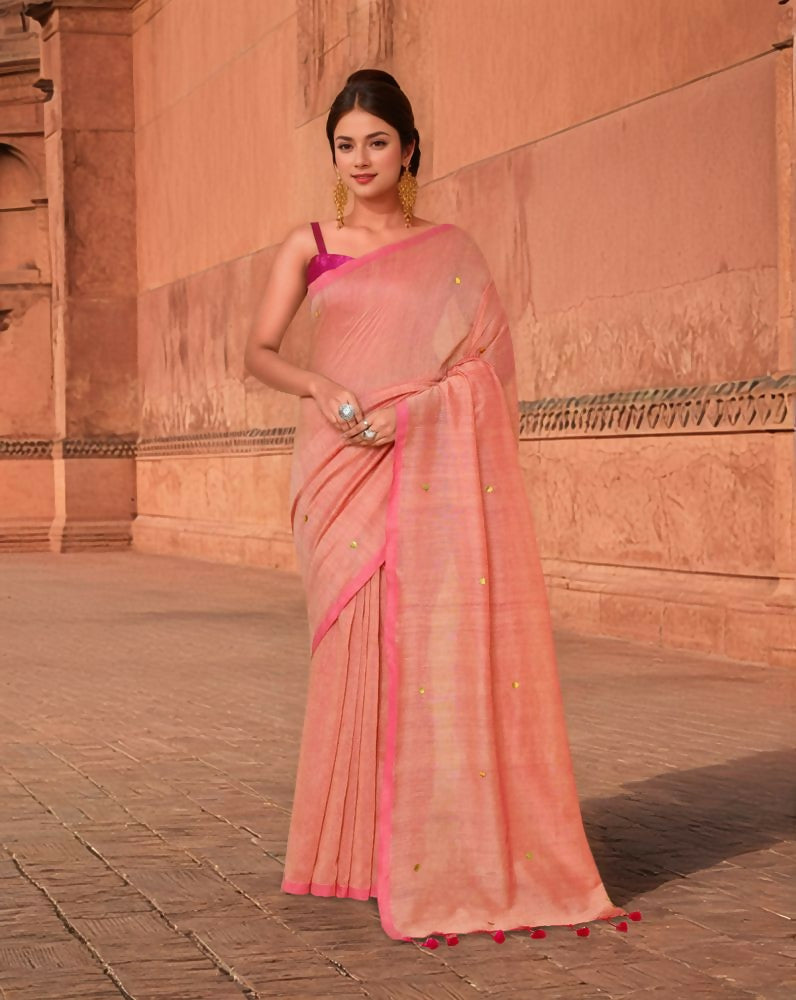 Elegant peach cotton saree for women, ideal for casual and festive ethnic styling.
