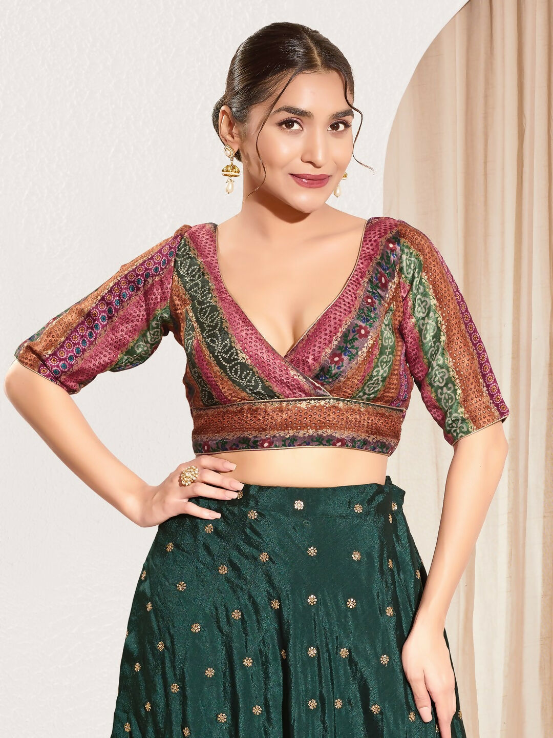 Magenta brocade padded blouse featuring a V-neck and elbow sleeves