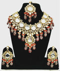 Handmade gold-plated Kundan stone necklace set with intricate alloy craftsmanship