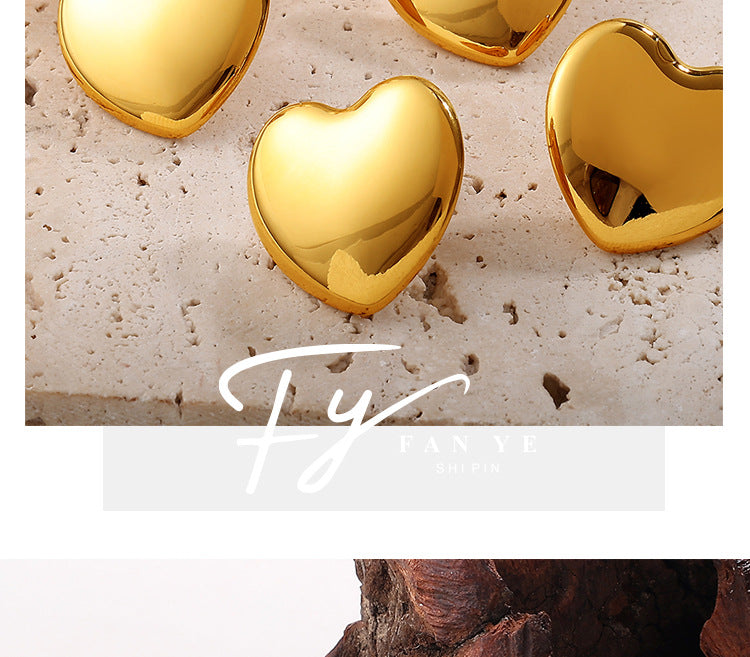 European And American Minimalist Glossy Heart-shaped Stainless Steel Earrings For Women. Light Luxury Minimalist Style. Exaggerated Heart-shaped Earrings. Versatile Accessories.