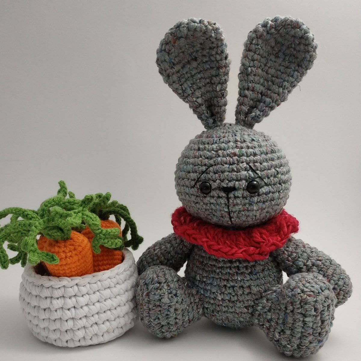 Handmade crochet Easter Bunny amigurumi made with speckled tweed yarn.