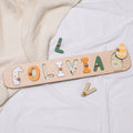 Personalized wooden name puzzle for kids featuring a cute bunny and Easter egg theme