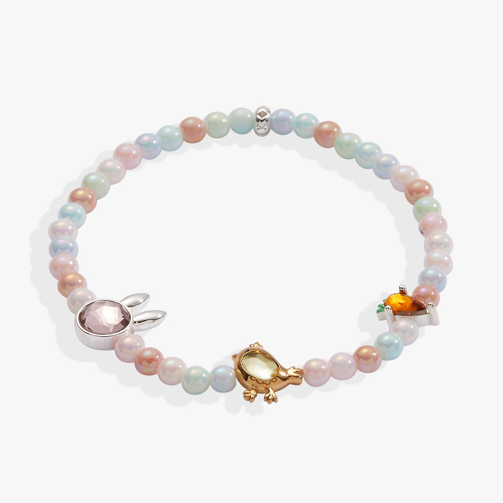 Crystal Bunny stretch bracelet with orange carrot, pink bunny, and yellow chick charms on pastel pearlized beads.