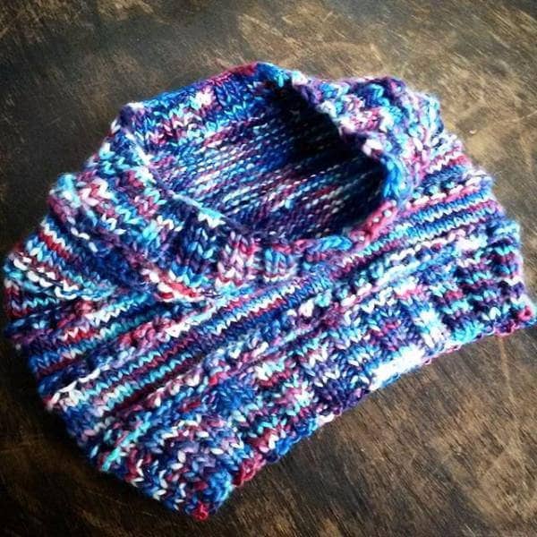 A finished soft Merino wool cowl knitted using the Easy Merino Cowl Pattern