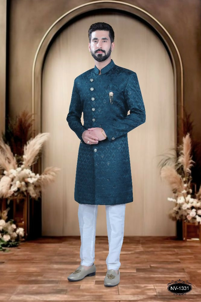 Toddler boy wearing a blue self-design TR kurta with matching polo pyjama pants